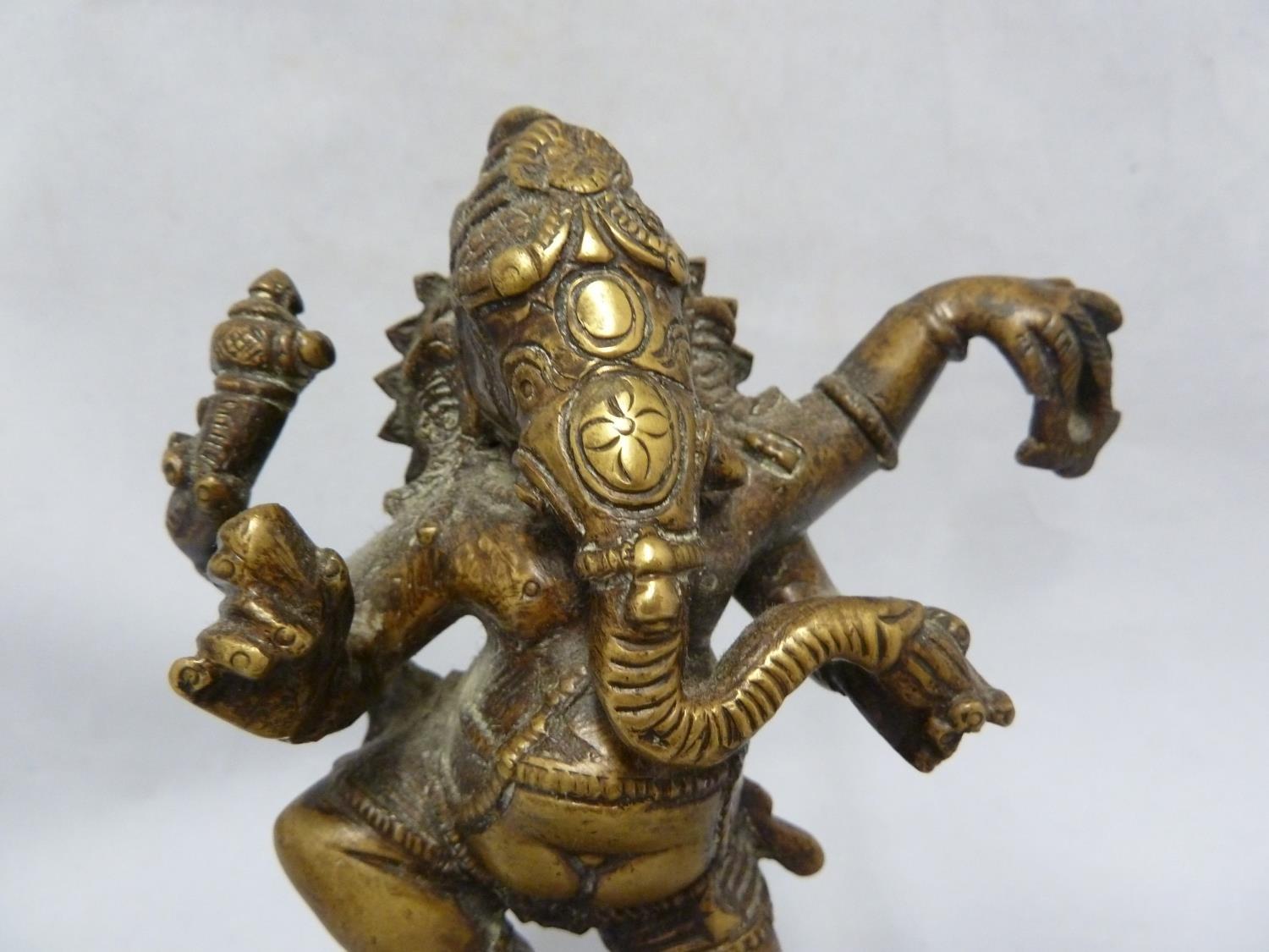 An Indian bronze figure of Ganesh as an elephant god, modelled standing on a lotus flower on stepped - Image 2 of 5