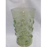 A German sea green glass beaker vase, of large size, applied with shell prunts, 29cm high