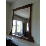 A bleached wood over mantel mirror, of reeded frame with half sunburst spandrels to the bottom, h
