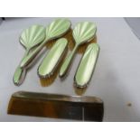 A Mappin and Webb guilloche enamel and silver dressing table set, the pale green enamel over waved