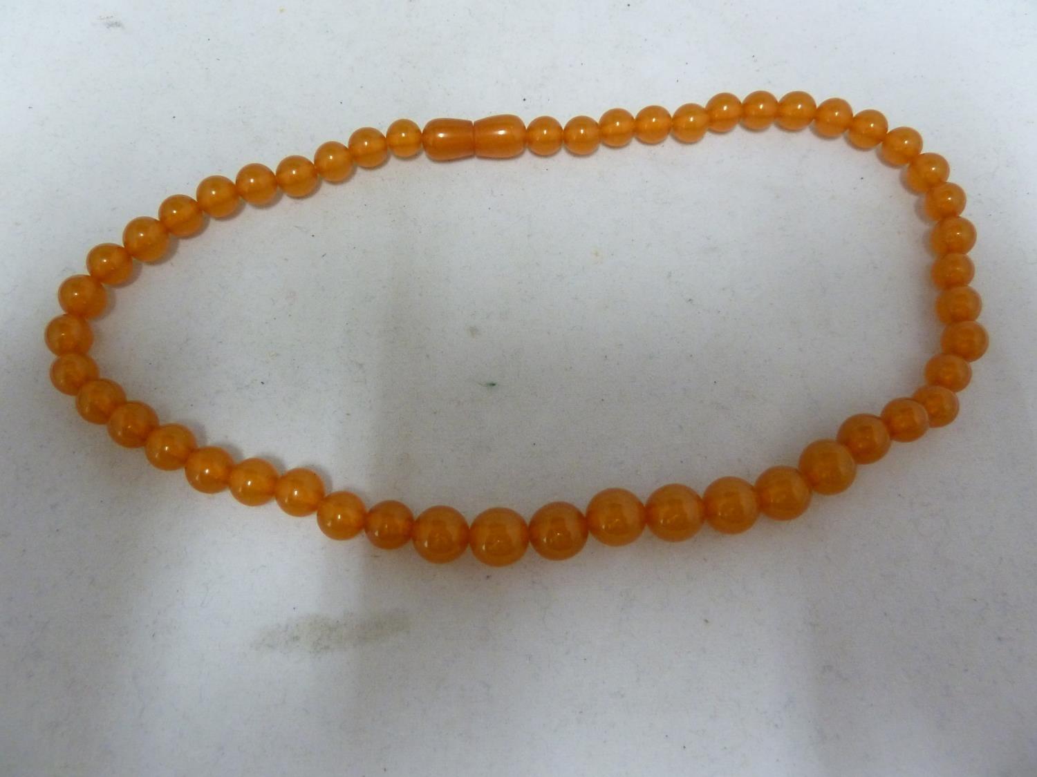 Various items of amber set jewellery comprising: two graduated round bead necklaces with screw - Image 3 of 9