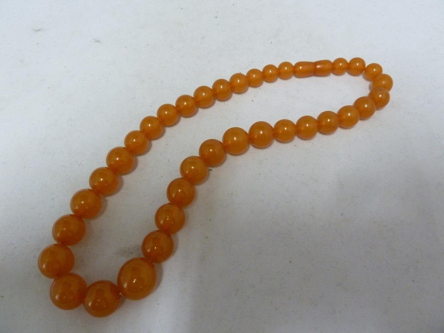 Various items of amber set jewellery comprising: two graduated round bead necklaces with screw - Image 6 of 9