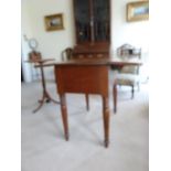 An oak drop leaf campaign table, with drawer front cupboard, w 87.5 cm x d 77 cm x h 15cm