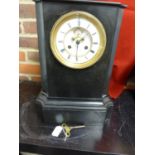 A black slate clock the dial marked Ambrosoni a Paris, with key (2)