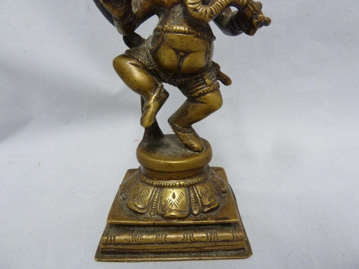 An Indian bronze figure of Ganesh as an elephant god, modelled standing on a lotus flower on stepped - Image 3 of 5