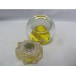 Caithness - a yellow planet glass paperweight the dome cut with a single circular lens facet, marked