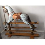 An Antique Ayres Nimrod, adult size rocking horse, recently restored, c1890, 137am high x 157cm long