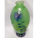An Italian glass vase, of ovid green glass body flecked with silver mica and decorated with