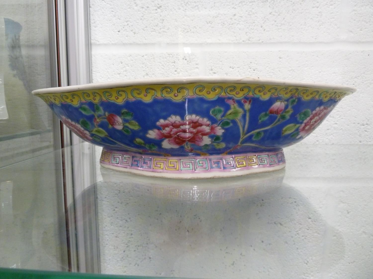 A Late Republic Chinese porcelain quatrefoil bowl, the exterior decorated with peonies on a blue