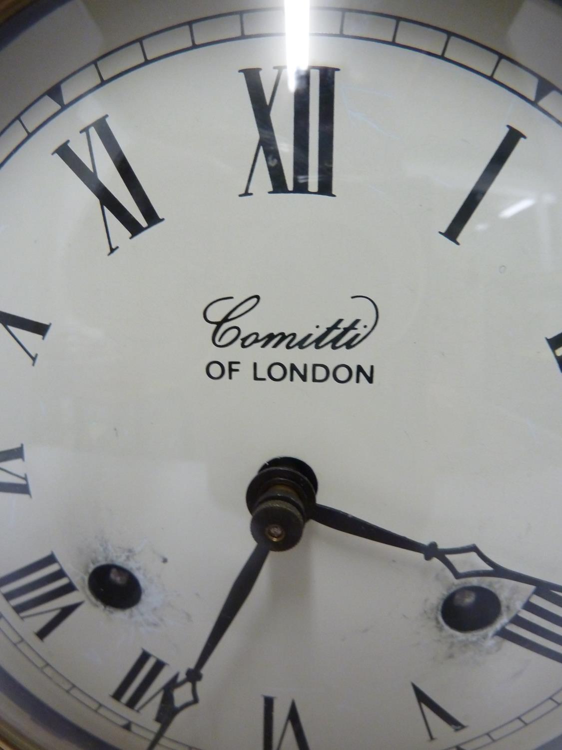 Comitti of London - A Regency style break arch clock, Roman numerals in black on a circluar white - Image 2 of 7