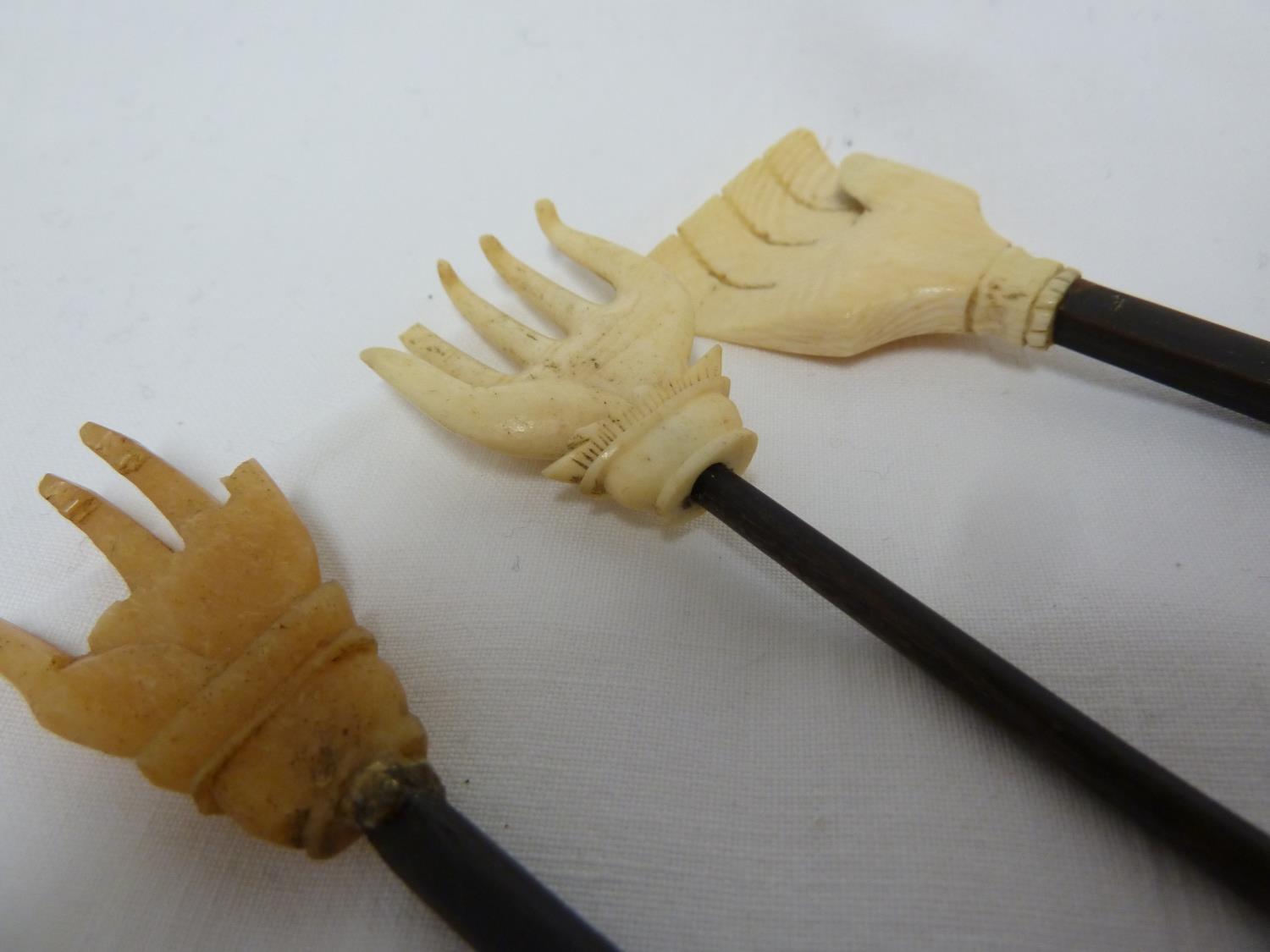 Three bone and turned wood back scratchers, each formed as a hand, 40cm and smaller (3) - Image 3 of 5