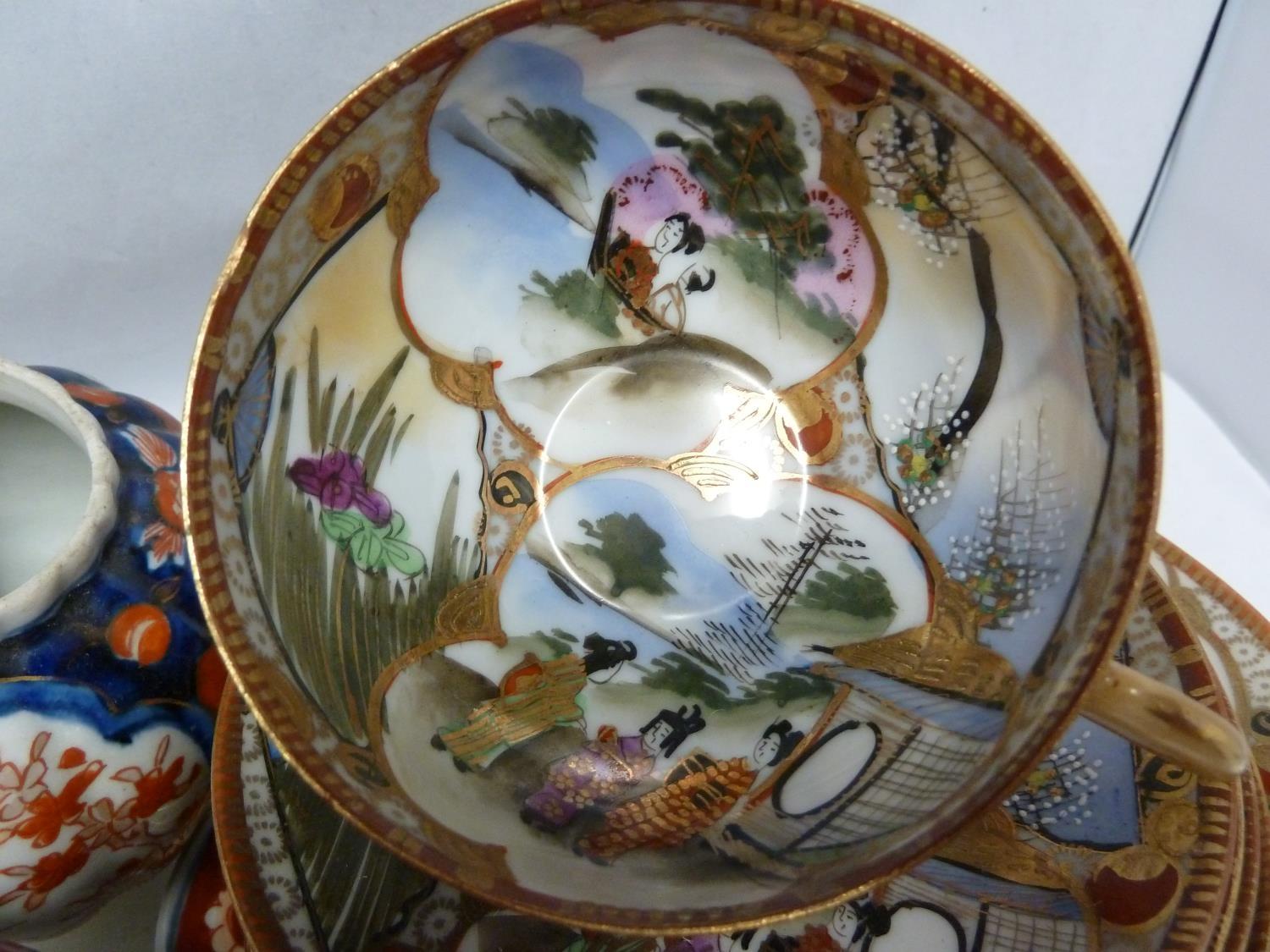 Japanese Imari porcelain - comprises a plate; and two vases, typically decorated in iron red and - Image 3 of 3