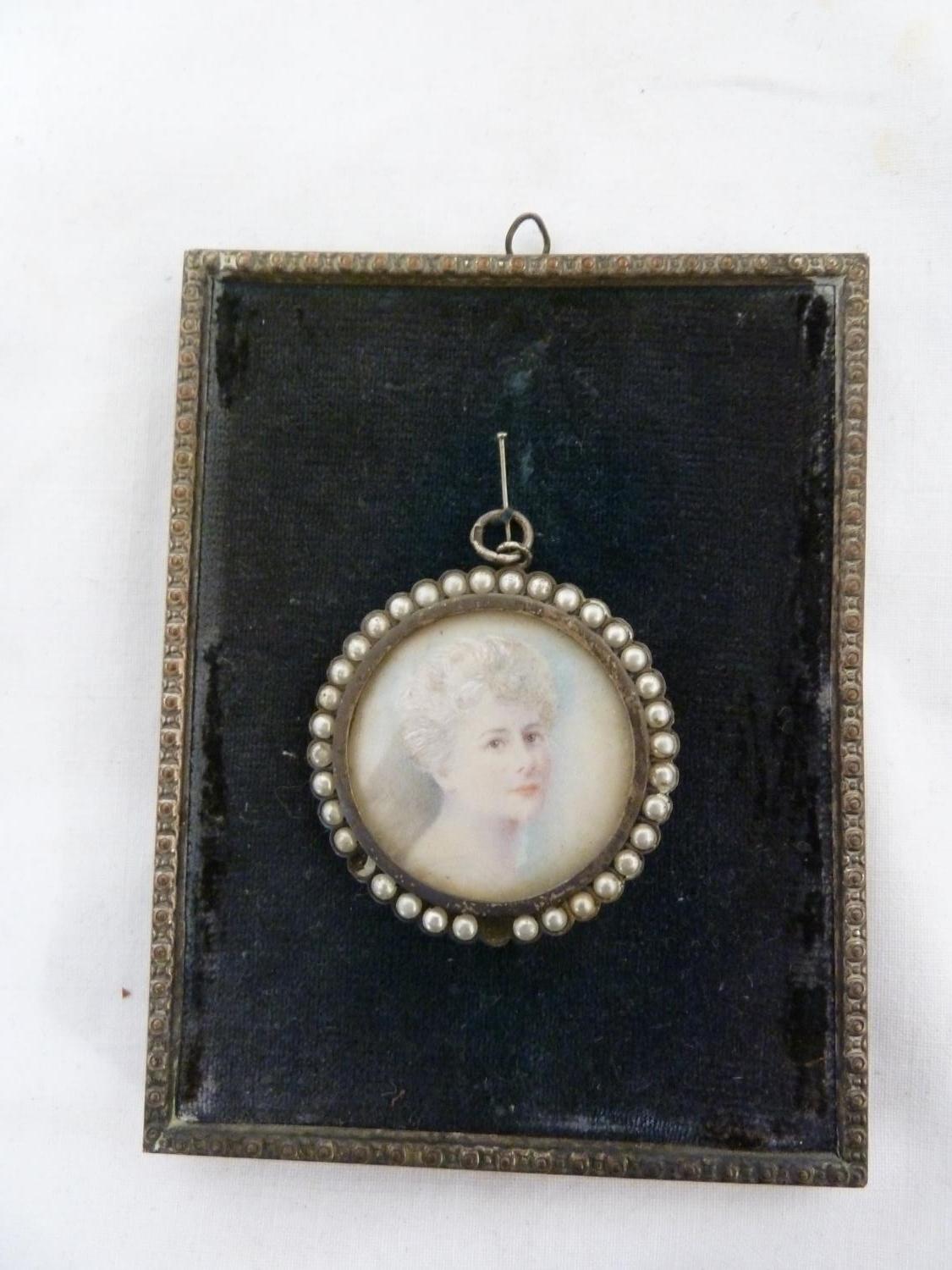 A portrait miniature of a woman, within a circular white metal frame set with half 'pearls', paper - Image 2 of 5
