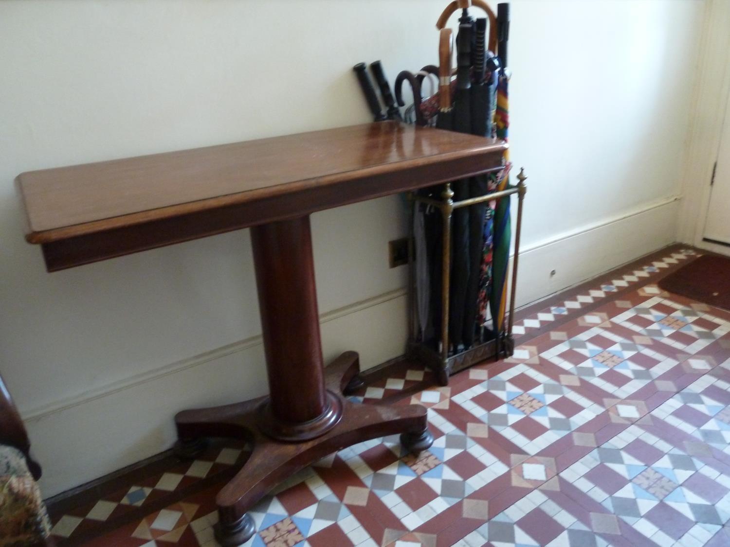 A Regency mahogany invalid or bedroom table with sliding mechanism to position over a bed, w 91 cm x