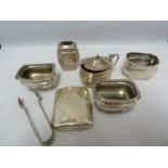 Five silver cruet items, comprising a pair of salts; mustard pot and hinged cover; mustard pot;