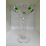 Stuart - An Art Nouveau green peacock feather glass trumpet vase, each green 'eye on the wavy rim