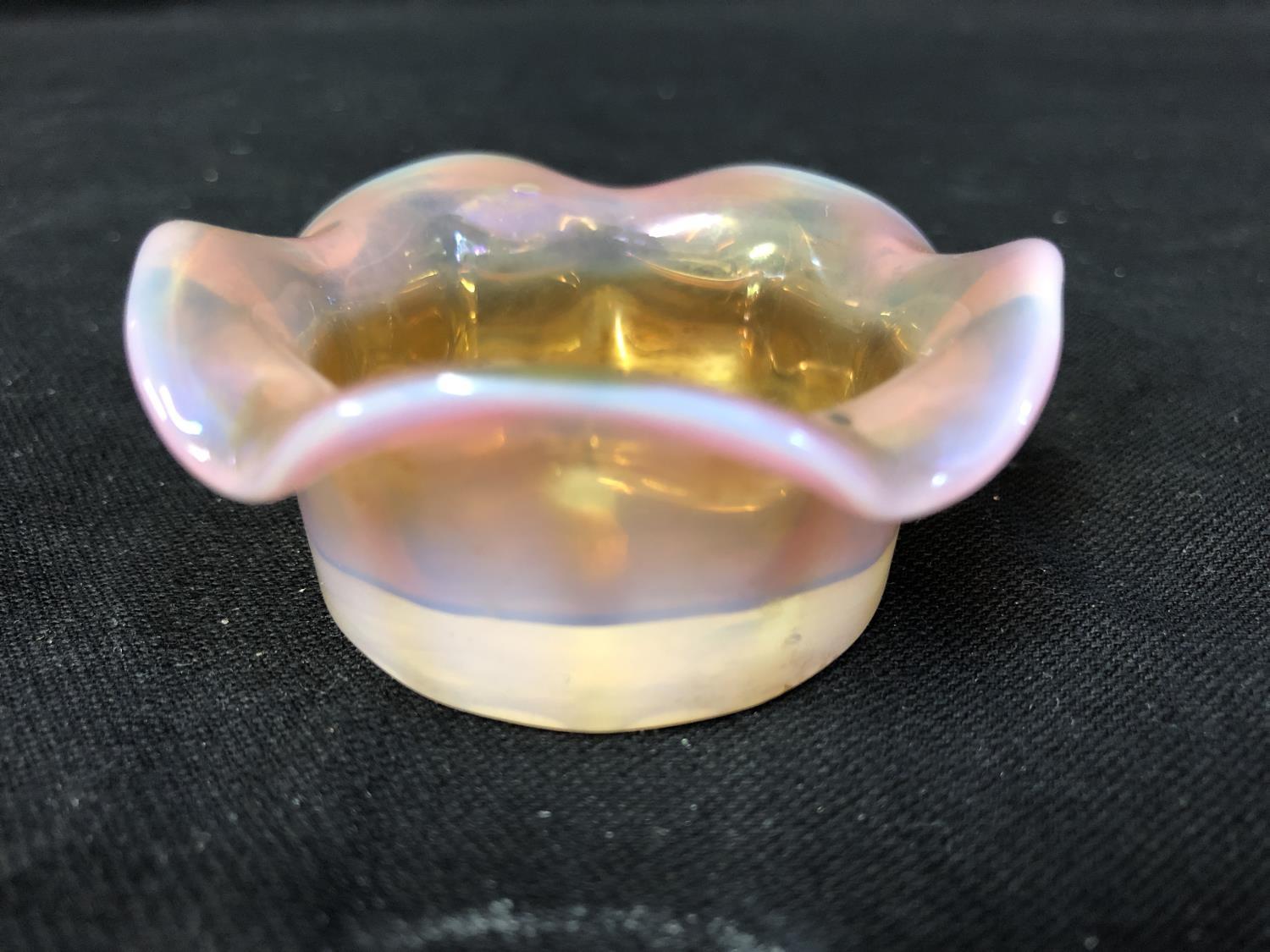 Cristallerie de Pantin - an iridescent opaline glass salt, pink/orange colouration, circular with