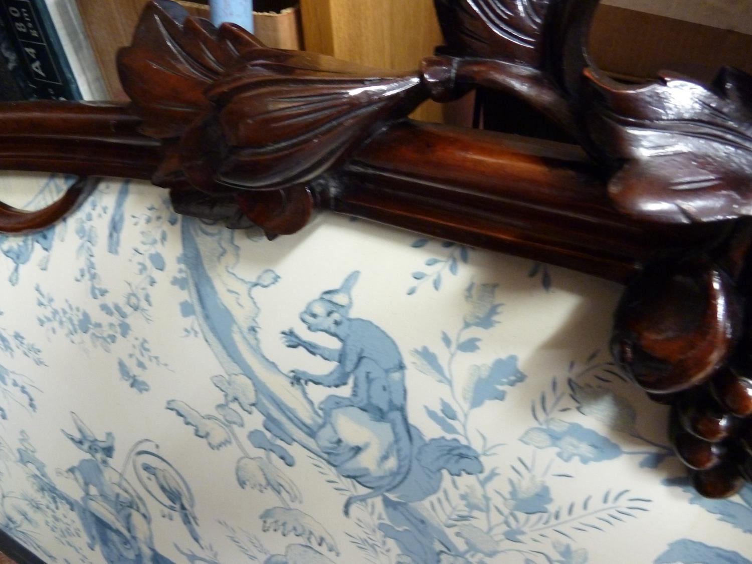 A French mahogany veneered carved wood headboard, decorated with a fruiting vine, upholstered - Image 2 of 5