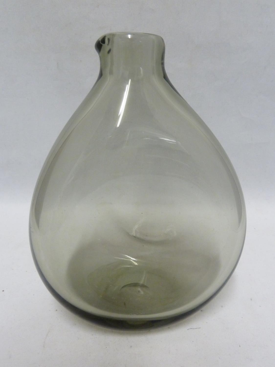 Per Lutken for Holmegaard - a York smoked glass caraffe, of flattened dimpled for in smoke grey, mid