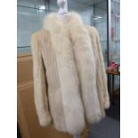 A white mink jacket with white fox fur collar, small size 10 approx