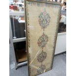 A large Ottoman embroidered panel, decorated with isnik style chain of foliate reserves in