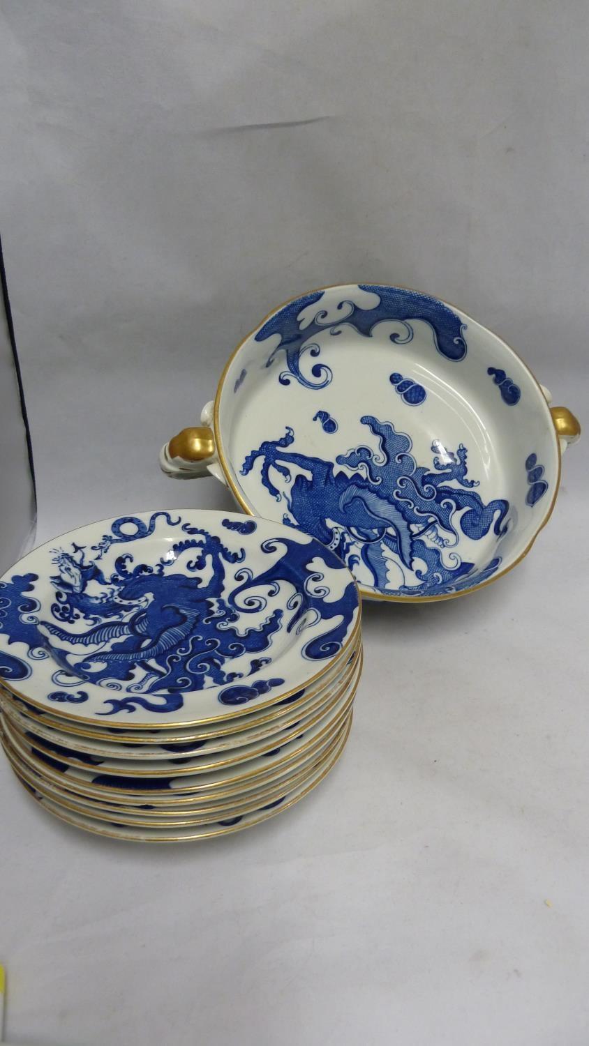 A Royal Worcester Porcelain dessert service, in Blue Dragon pattern, comprises fruit bowl with