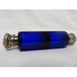 A silver mounted Bristol blue glass double ended perfume bottle, one end with flip top cover, the