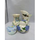Four items of Art Deco Pottery - comprising: a Flying Duck jug' a Japanese Daisy preserve pot and