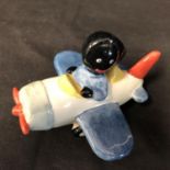 Carlton Ware - A limited edition small Golly in his aeroplane, numbered 17/25, gollys head and