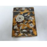 A Victorian tortoiseshell visiting card case, inlaid with a peony spray and leaves in nacreous