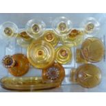 A Quantity of amber glass items including an Art Deco dressing table set; candlesticks and vases (
