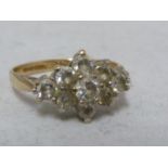 A 9ct yellow gold cluster ring, set with cubic zirconia in a diamond shape, ring size I 1/2, 1.7