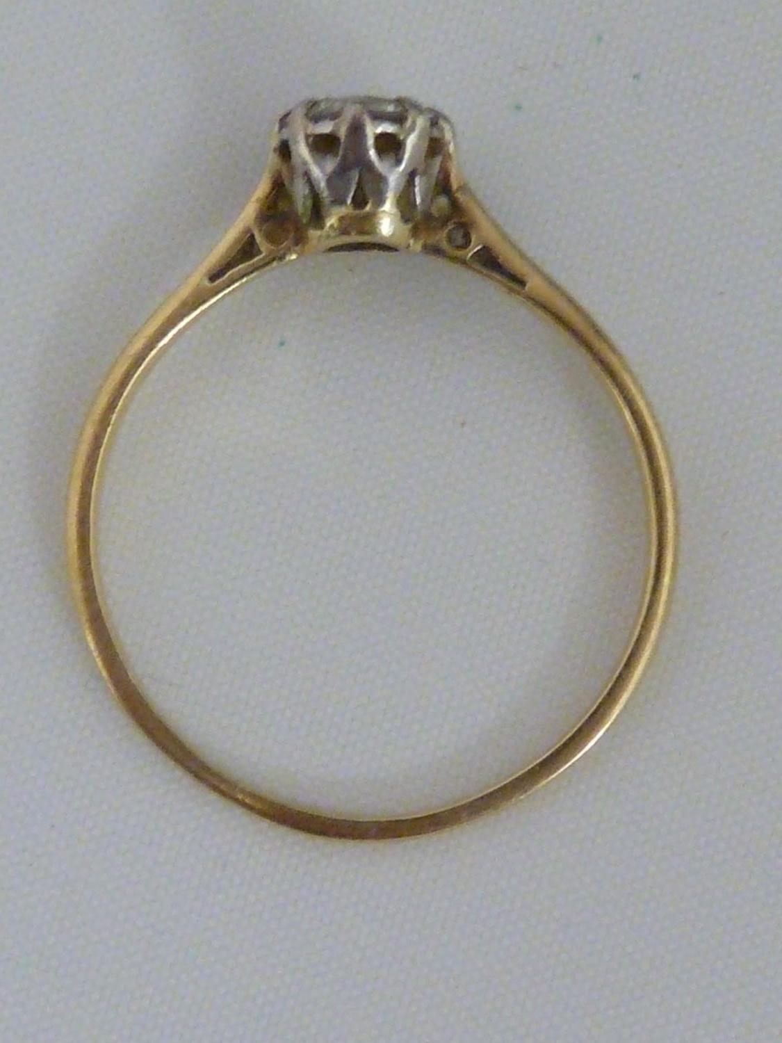 A solitaire diamond ring, the single round diamond of approx 0.5 carat set in an unmarked yellow - Image 5 of 9