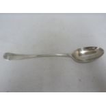A silver stuffing spoon, rat tail, London 1913, makers mark of W over SD H Ltd for William