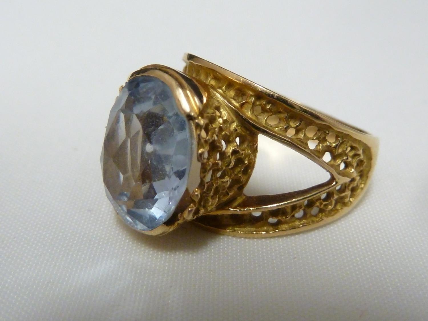 An aquamarine set ring, set in pierced yellow metal, stamped with Arabic marks; a marquise ring - Image 2 of 13