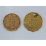 A Victorian half sovereign gold coin, 1892, 4grms approx; and a George I 'Guinea', 4grms (2)