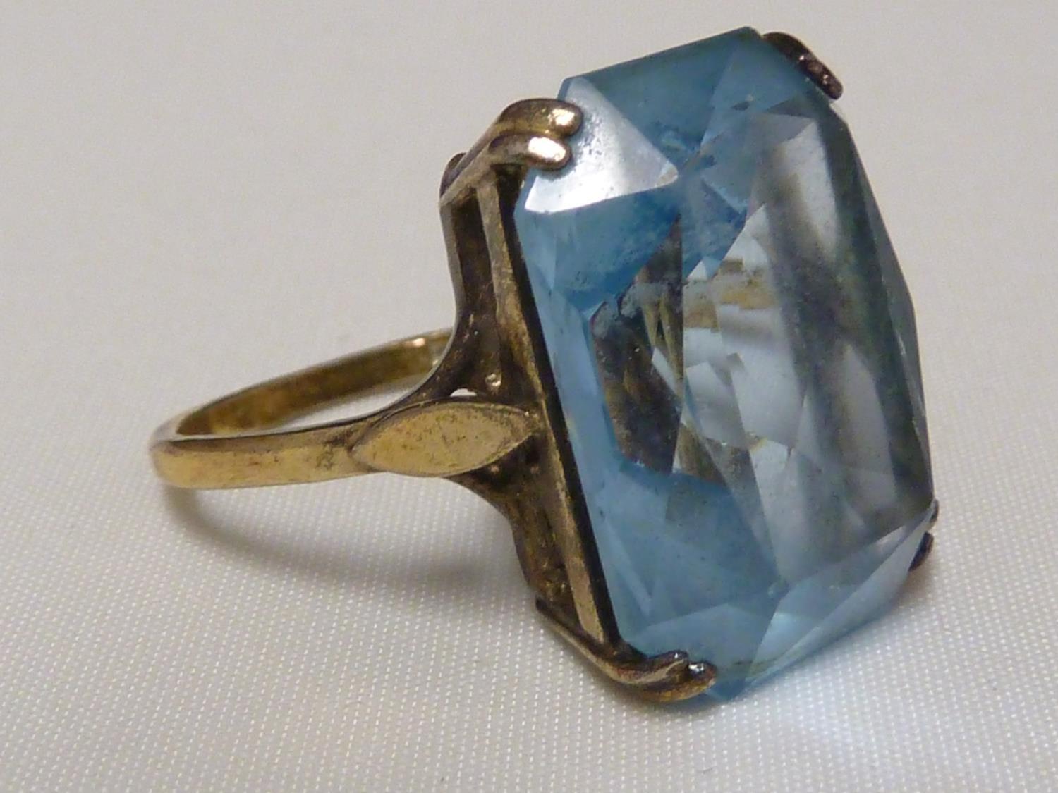 An aquamarine set ring, set in pierced yellow metal, stamped with Arabic marks; a marquise ring - Image 5 of 13