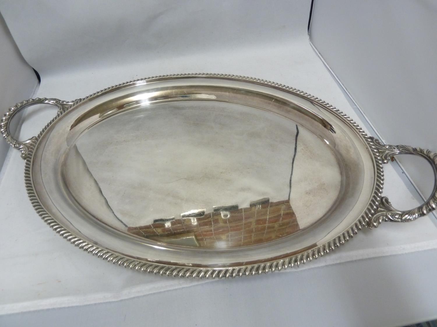 A large silver plated two handled tray, of oval shape, 58cm max diam approx; and one large - Image 3 of 10