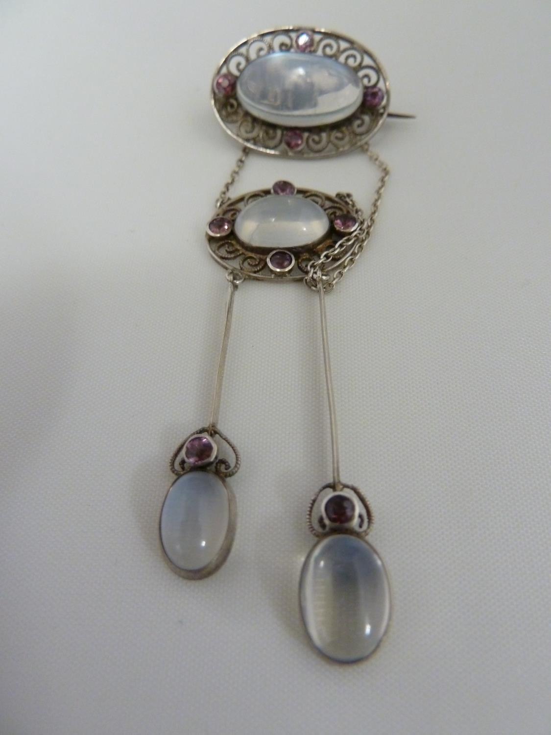 A Belle Epoque pendant and brooch set, the white metal filigree work supporting oval moonstones - Image 3 of 7