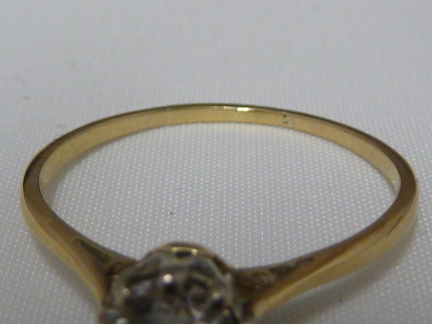 A solitaire diamond ring, the single round diamond of approx 0.5 carat set in an unmarked yellow - Image 8 of 9