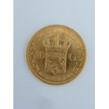 A 10G Koningrijk der Nederlanden gold coin, 1925, 2.2cm diam, 6.7grms approx, in presentation box (2