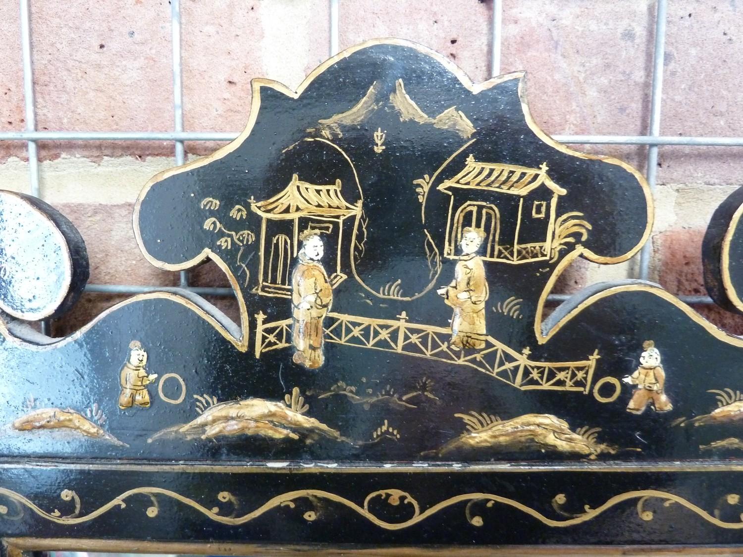 A Chinoiserie black japanned framed looking glass, decorated with gilded raised figures in a - Image 2 of 7