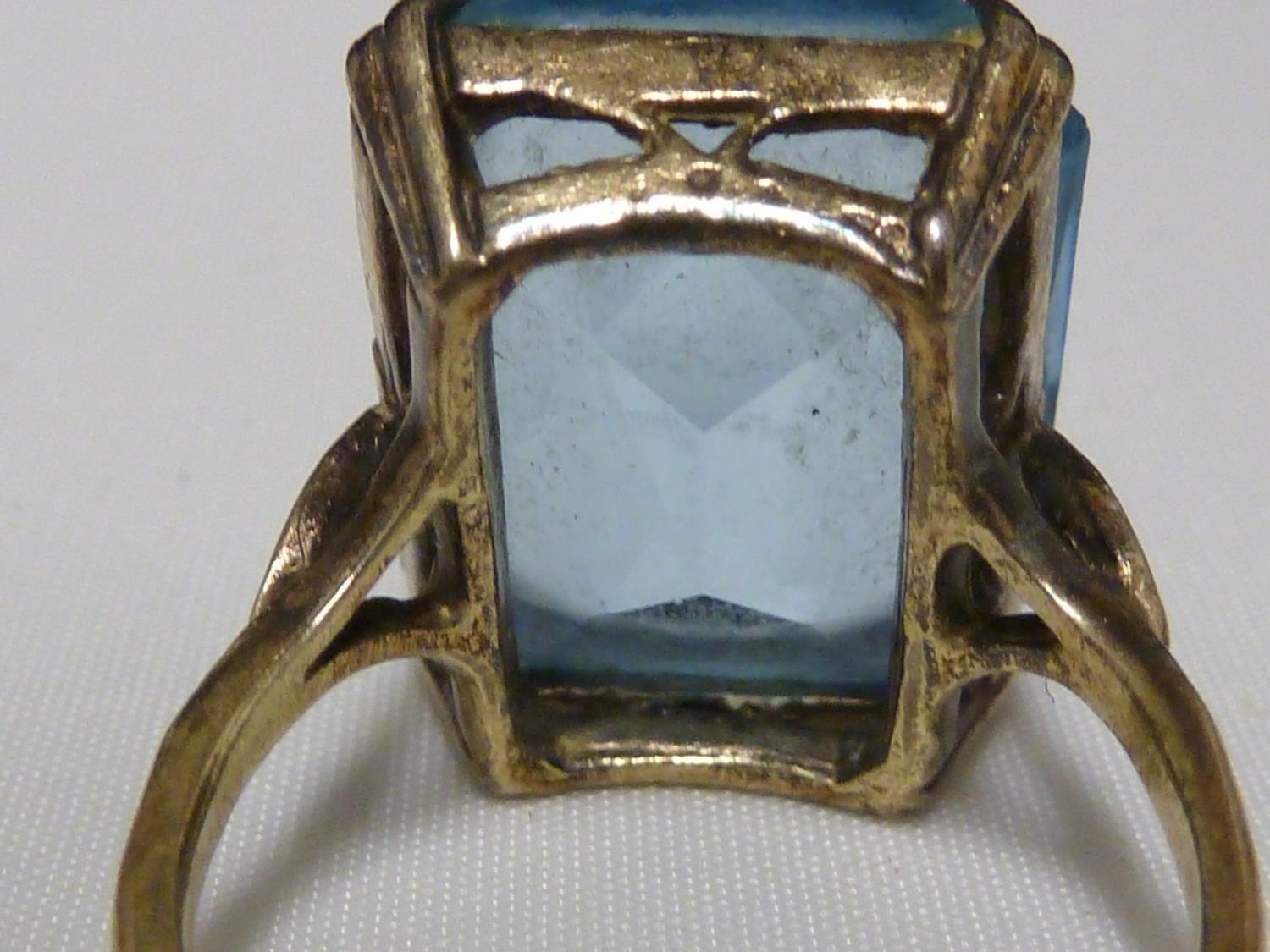 An aquamarine set ring, set in pierced yellow metal, stamped with Arabic marks; a marquise ring - Image 6 of 13