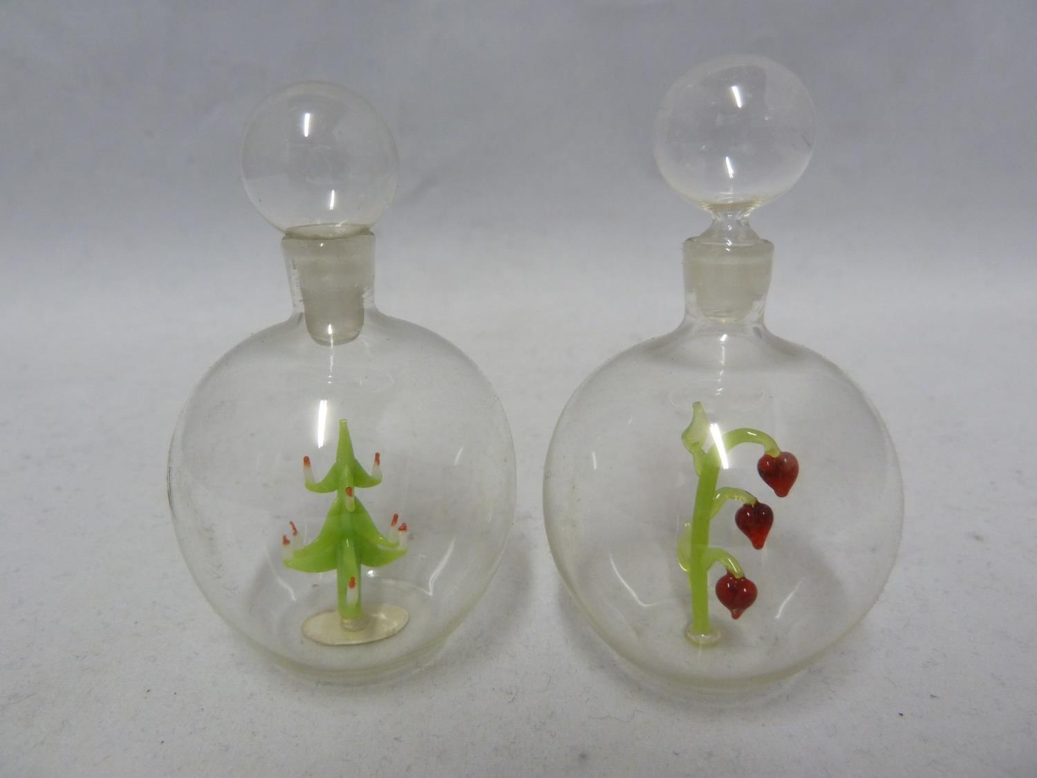Austrian Glass - two lampwork perfume bottles, the colourless globular soap bubble glass bottles