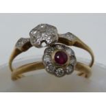 A ruby and diamond ring, the central ruby encircled by eight round brilliant cut stones set in an