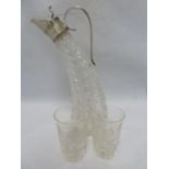 English Glass - an unusual cut glass Vodka jug, with EPNS mounts, of curved form, 28.5cm; together