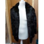 A Coney fur jacket, dark brown/black colour, marked size 10