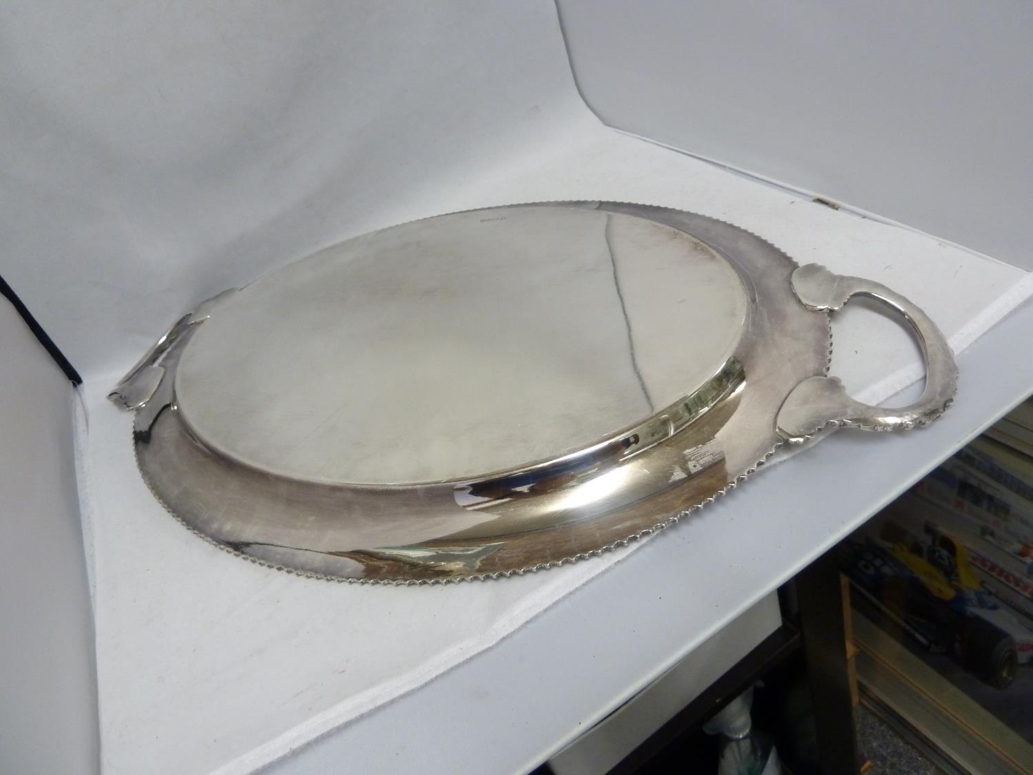 A large silver plated two handled tray, of oval shape, 58cm max diam approx; and one large - Image 5 of 10