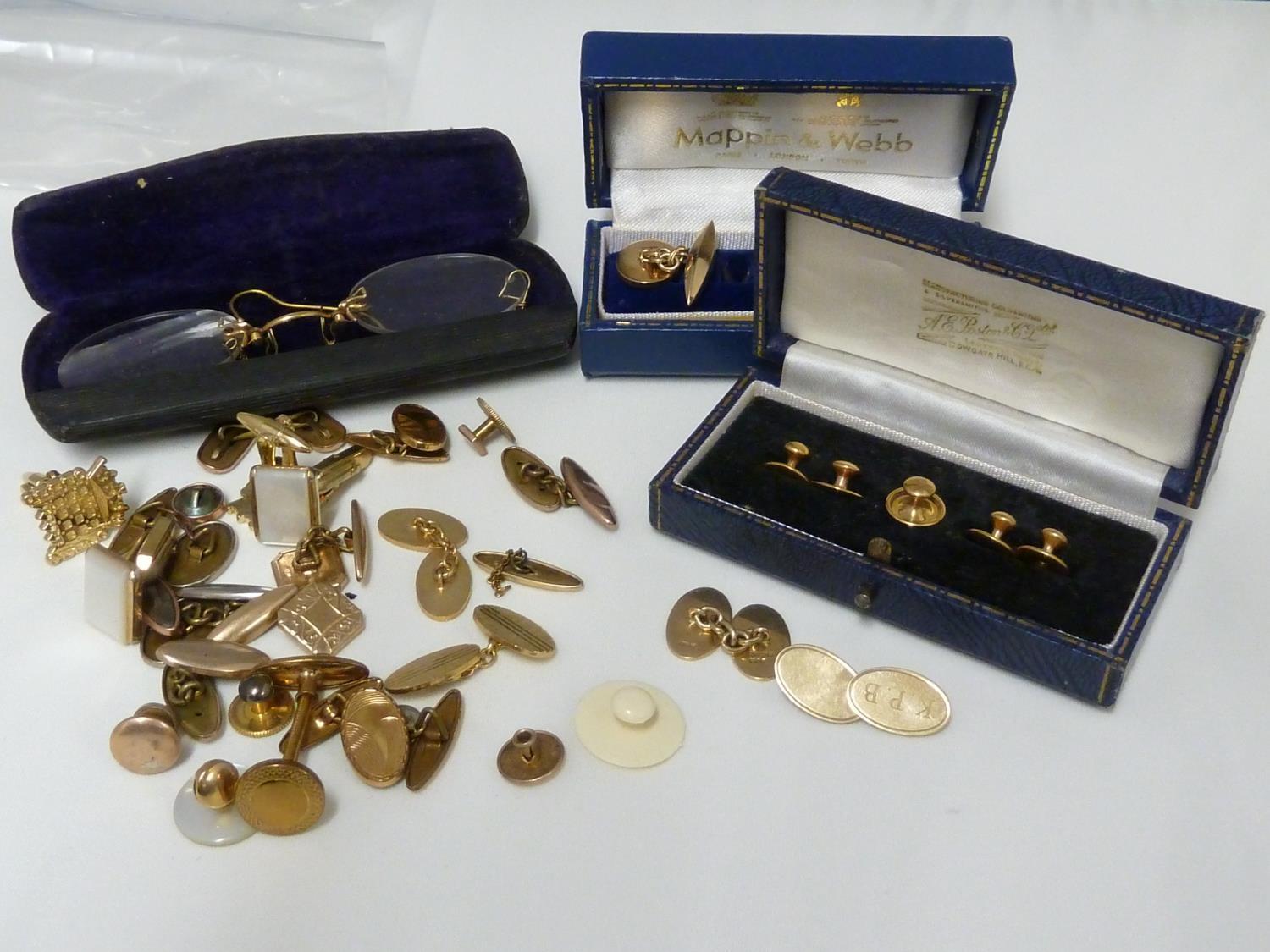 A pair of 9ct yellow gold Gentlemans cufflinks, in Mappin and Webb box, 11 grms approx; one other