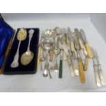A quantity of EPNS cutlery, mostly fancy wares - jam spoons; a cased set of berry spoons; and